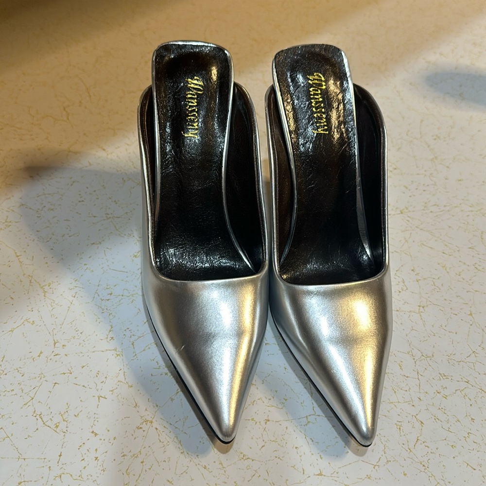 Classy silver slides!These are so unique!Like new!Never worn!